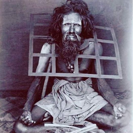 A Sadhu wearing an iron collar-Stumbit Hinduism